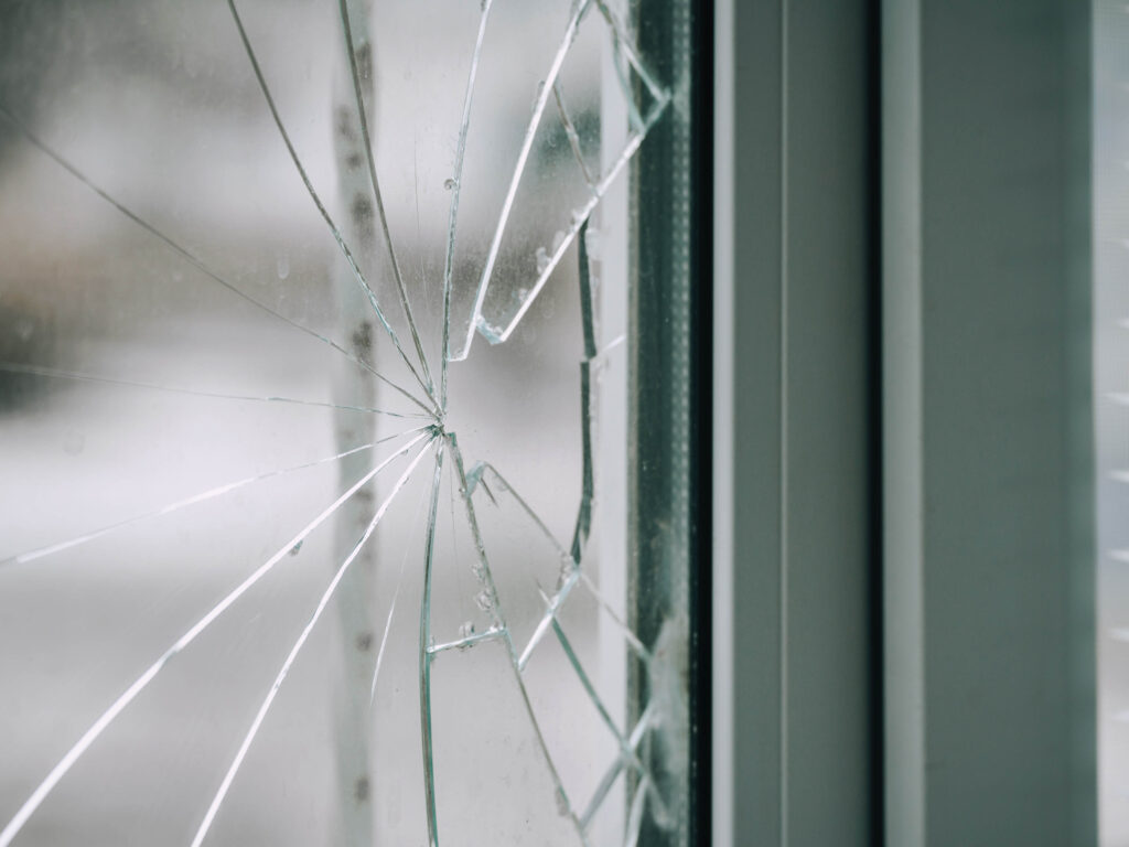 broken window glass represents targeted entry points in homes and businesses