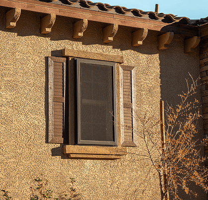 front view of security screen window on a mud home installed by guardian security screens