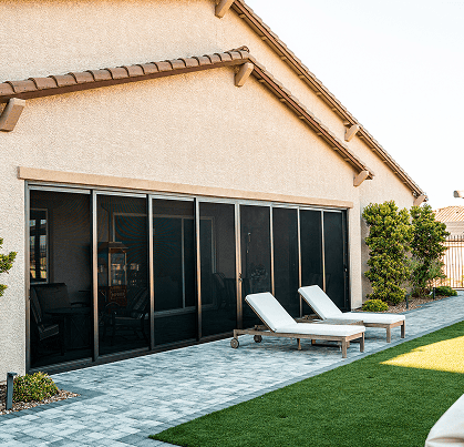 crimsafe security screens installed on large patio doors of a home by guardian security screens