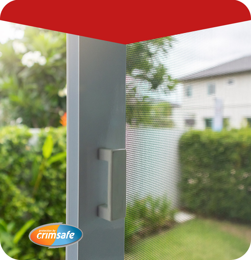 close view of security screens on window installed by guardian security screens